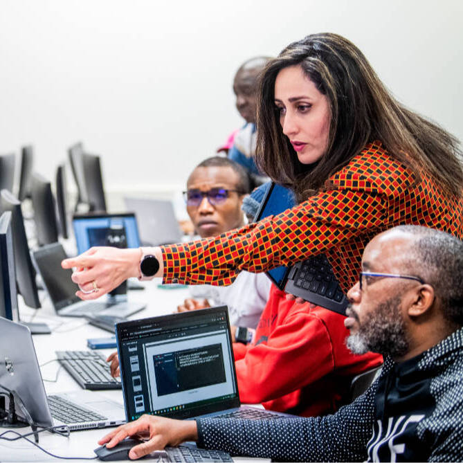 Students and Faculty in Cybersecurity Class.